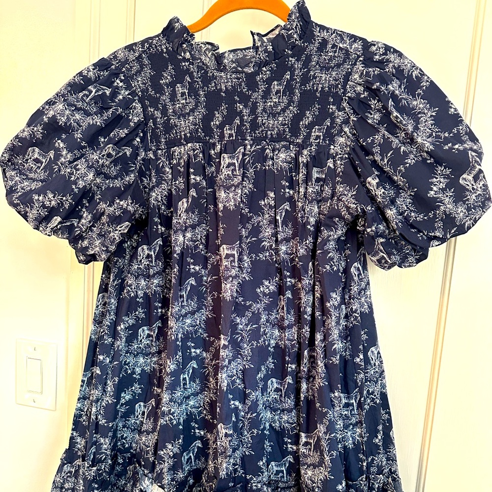 Navy ruffle neck dress with bubble sleeves and horse print